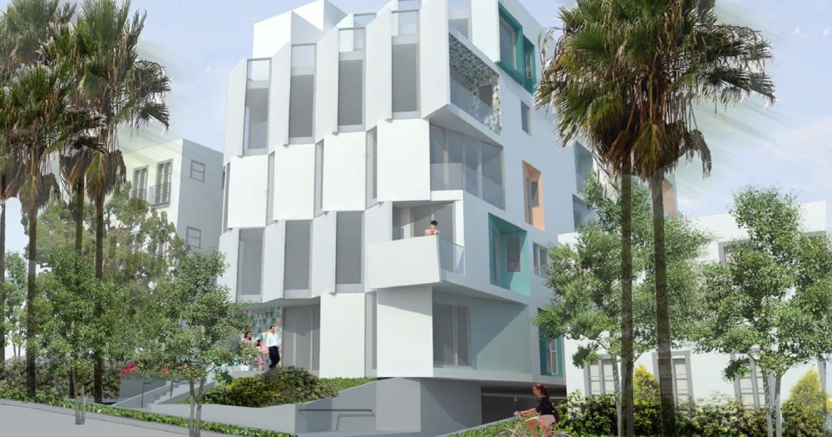 Fivestory apartment building rising at 1920 N Whitley Avenue in